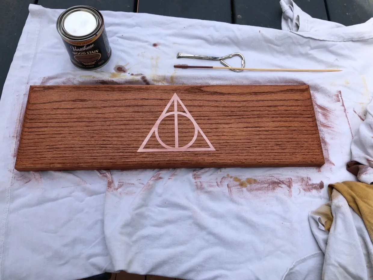 Step 7 — darker stain applied over decal